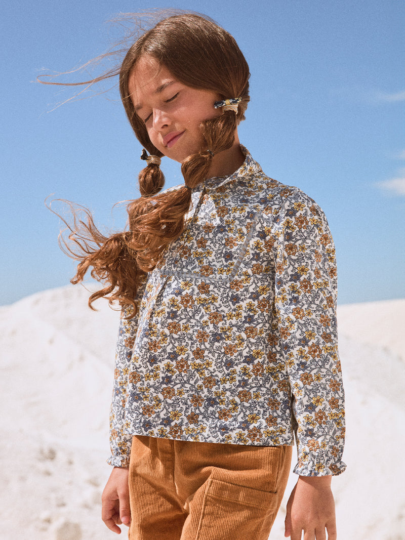 Mädchenbluse mit Kragen und Blumenmuster