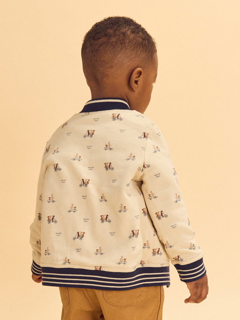 Reversibler Teddy in Marineblau oder Elfenbein mit Hundemuster für Baby Jungen