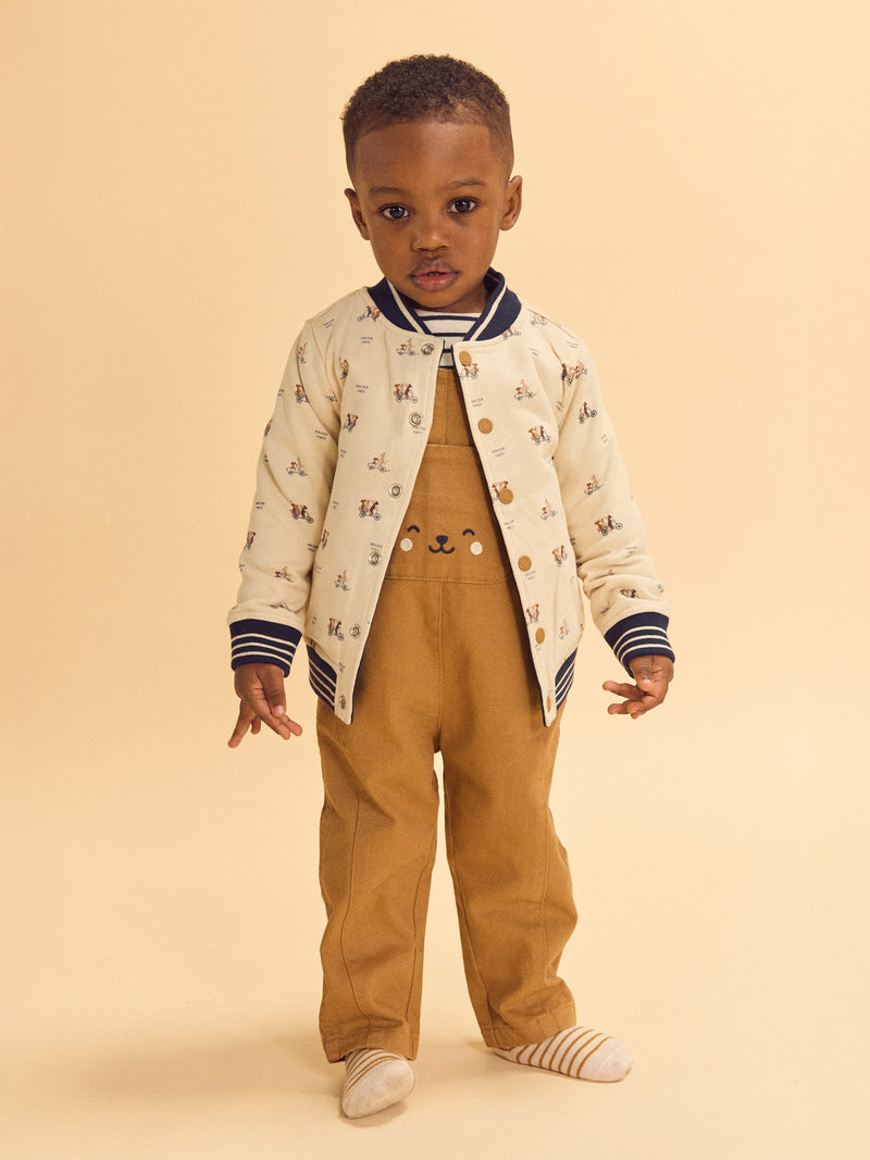 Reversibler Teddy in Marineblau oder Elfenbein mit Hundemuster für Baby Jungen
